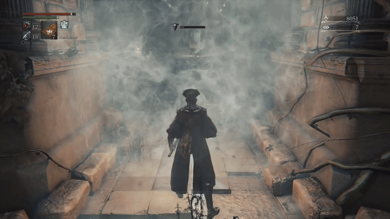 A hunter in a long black coat and tricorn hat pushes through a wall of fog into a run down stone chapel, lined with columns and torches. A lone figure, on all fours, slowly trudges toward the hunter from the distant shrine of the chapel.