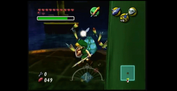 In a dark interior pipeworks chamber flooded with water, Link from The Legend of Zelda Majora's Mask. Link shoots two magic ice arrows into the water, creating two ice platforms, which he hops across.