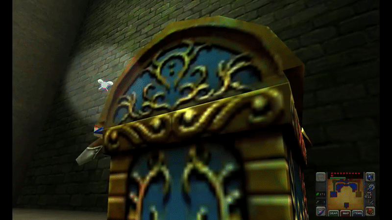 Link from The Legend of Zelda Ocarina of Time runs up to an ornate golden chest in a dank dungeon. Light pours forth from it, and slowly, dramatically, Link holds aloft a golden key inset with a red skull jewel.